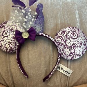 Purple Minnie ears with feather and crown